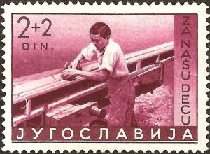 Colnect-3227-199-Scenes-from-the-life-of-a-child---Boy-at-work.jpg