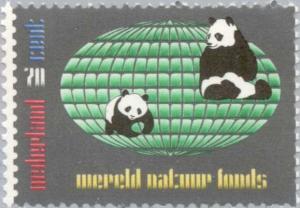 Colnect-175-839-Giant-Panda-Ailuropoda-melanoleuca-in-front-of-a-Green-Glo.jpg