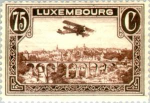 Colnect-133-506-Biplane-over-Luxembourg-City.jpg