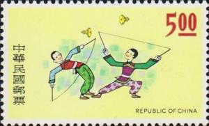 Colnect-3024-019-two-acrobats-with-a-string-wrapped-on-a-carved-bamboo.jpg