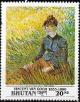 Colnect-3319-195-Woman-sitting-in-the-Grass.jpg