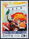 Colnect-3097-853-Soldier-with-book-on-the-Juche-idea-workers-and-peasants.jpg