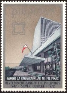 Colnect-738-076-Bank-building--amp--badge.jpg