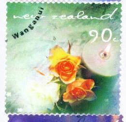 Colnect-520-273-Candle--amp--Flowers.jpg