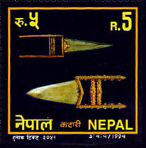 Colnect-1105-046-Traditional-Weapons--Carved-stone-daggers.jpg