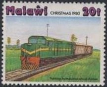Colnect-1733-795-Train-passing-through-man-made-pass.jpg