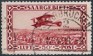 Colnect-880-198-Plane-flying-Saarbr-uuml-cken.jpg
