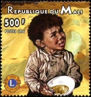 Colnect-2694-712-Child-Eating.jpg
