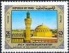 Colnect-2590-409-Dome-and-minaret-of-the-mosque-in-Mecca.jpg