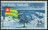 Colnect-5138-105-Lom%C3%A9-Harbor-and-Togolese-flag.jpg