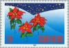 Colnect-160-327-Christmas-flowers-in-the-snow.jpg