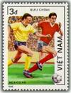 Colnect-1631-599-Two-Football-Players-ball-below.jpg