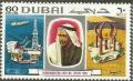 Colnect-2073-361-Sheik-Rashid-bin-Said-oil-rig-and-monument.jpg