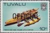Colnect-4020-340-Hand-carved-model-canoe---Official-overprint.jpg