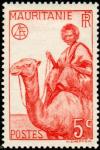 Colnect-803-008-Man-on-Dromedary-Camelus-dromedarius.jpg