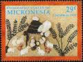 Colnect-4235-353-Sheep-around-manger.jpg