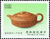 Colnect-4841-839-Yellow-clay-teapot.jpg