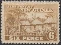Colnect-2547-493-Native-huts-and-palm-trees.jpg