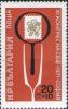 Colnect-1689-256-Loupe-Tweezer-and-Stamp.jpg