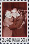 Colnect-2954-969-Deng-Xiaoping-and-Kim-Il-Sung-embracing.jpg