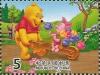 Colnect-4706-943-Winnie-the-Pooh-pushing-King-Penguins-Piglet-in-wheelbarrow.jpg
