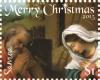 Colnect-3617-333--The-Birth-of-Christ--detail-by-Lorenzo-Lotto.jpg