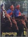 Colnect-1292-063-Mongolian-children-on-horses.jpg