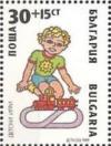 Colnect-1814-046-Boy-playing-with-a-Model-Railway.jpg
