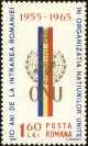 Colnect-4968-121-UNO-badge-in-front-of-Romanian-flag.jpg