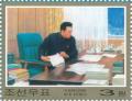 Colnect-3199-592-Kim-Jong-Il-at-the-desk.jpg