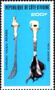 Colnect-6142-457-Fly-wisk-and-Panga-knife-sybols-of-Akana-Royal-Family.jpg