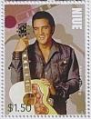Colnect-4748-008-Elvis-Presley-holding-guitar-by-neck.jpg