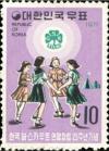 Colnect-2722-492-Girl-scouts-and-emblem.jpg