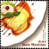 Colnect-1017-605-Custard-in-shell-with-lines-of-chocolate-sauce.jpg