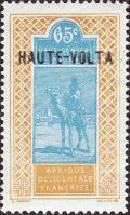 Colnect-2998-469-Dromedary-Camelus-dromedarius-with-Rider.jpg