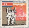 Colnect-2624-429-Flag-cheering-family-in-front-of-party-building.jpg