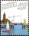 Colnect-841-935-Church-and-harbour-Monnickendam.jpg