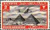 Colnect-1282-015-Aircraft-flying-over-the-Pyramids-of-Giza.jpg