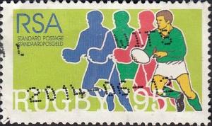 Colnect-3372-345-Player-running-with-Ball-and-Silhouettes.jpg