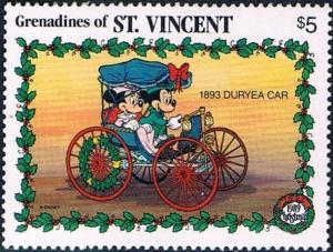 Colnect-3042-662-Mickey-and-Minnie-Mouse-in-Duryea-car-1893.jpg