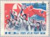 Colnect-2609-591-Demonstrators-in-front-of-a-North-Korean-flag.jpg