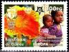 Colnect-4635-125-Children-and-red-yellow-flower.jpg