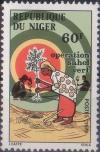 Colnect-5369-273-Women-planting-seedlings.jpg