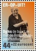 Colnect-538-475-Woman-with-shopping-bag.jpg