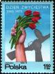 Colnect-1989-677-Hands-holding-tulips-and-rifle.jpg