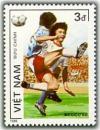 Colnect-1631-598-Two-Football-Players-ball-up.jpg