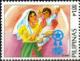 Colnect-1353-790-Christmas--Mother-child-signalling-peace.jpg