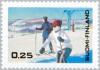 Colnect-159-508-Skiing-tourists-and-chair-lift.jpg