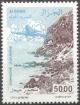 Colnect-2314-555-Plane-over-Jijelienne-Coast.jpg