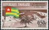 Colnect-573-183-Lom%C3%A9-Harbor-and-Togolese-flag.jpg
